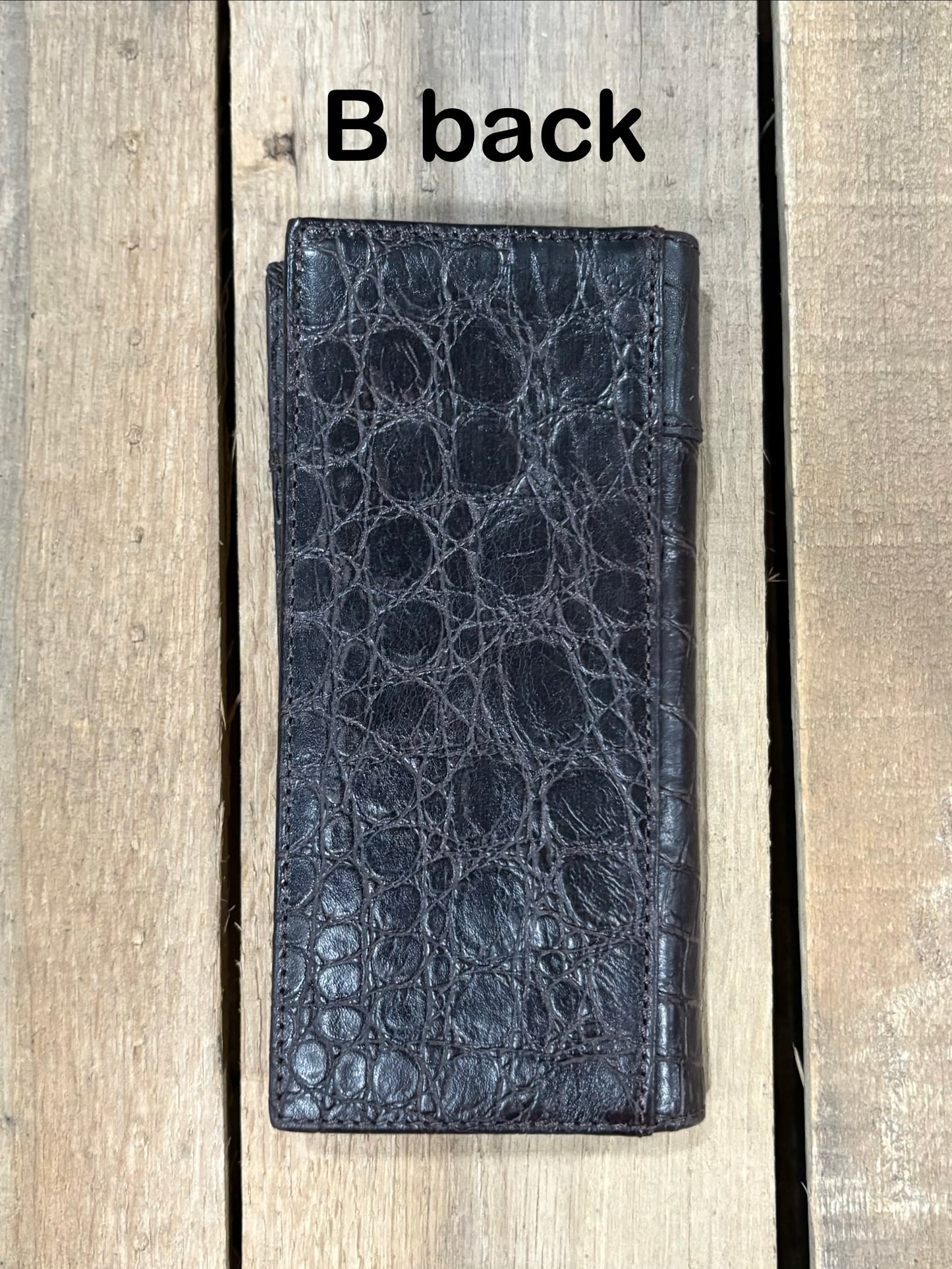 Coffee Brown leather wallet on a wooden surface with 'B back' text. Back View