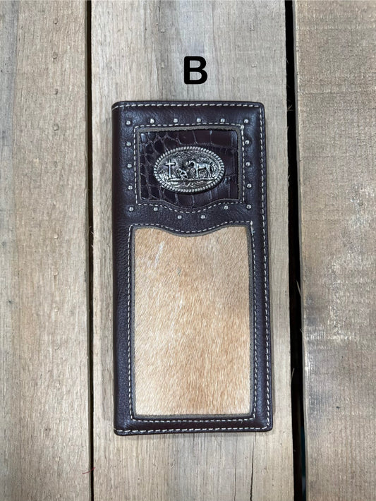 Coffee brown leather wallet with praying cowboy concho design on a wooden surface