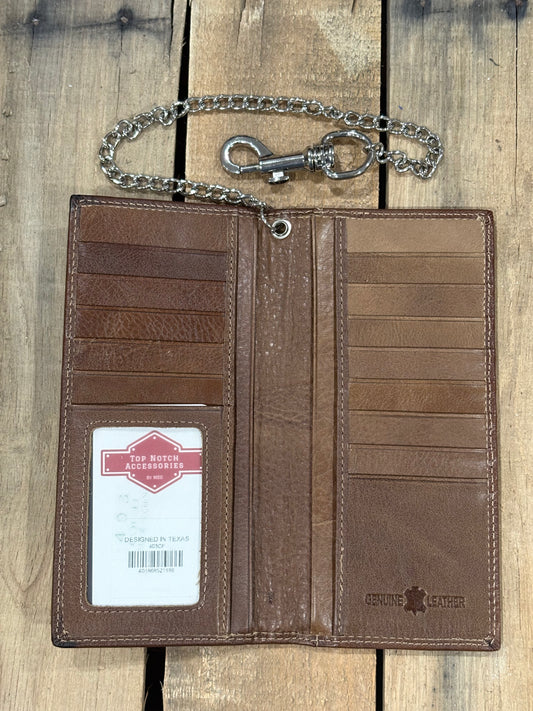 Brown leather wallet inside view with a chain and clasp on a wooden background
