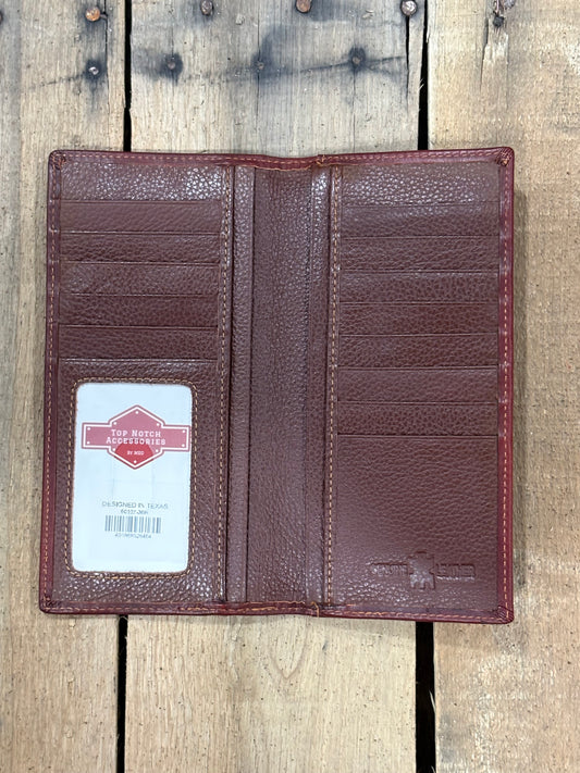 Inside View of Brown leather wallet with a brand label on a wooden surface