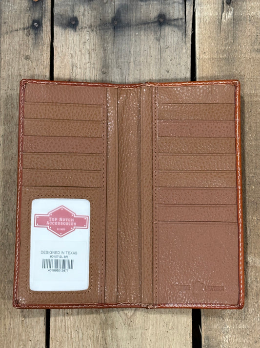 Inside View of Light Brown leather wallet with a brand label on a wooden surface