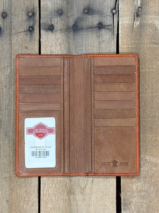 Inside View of Light Brown leather wallet with a brand label on a wooden surface