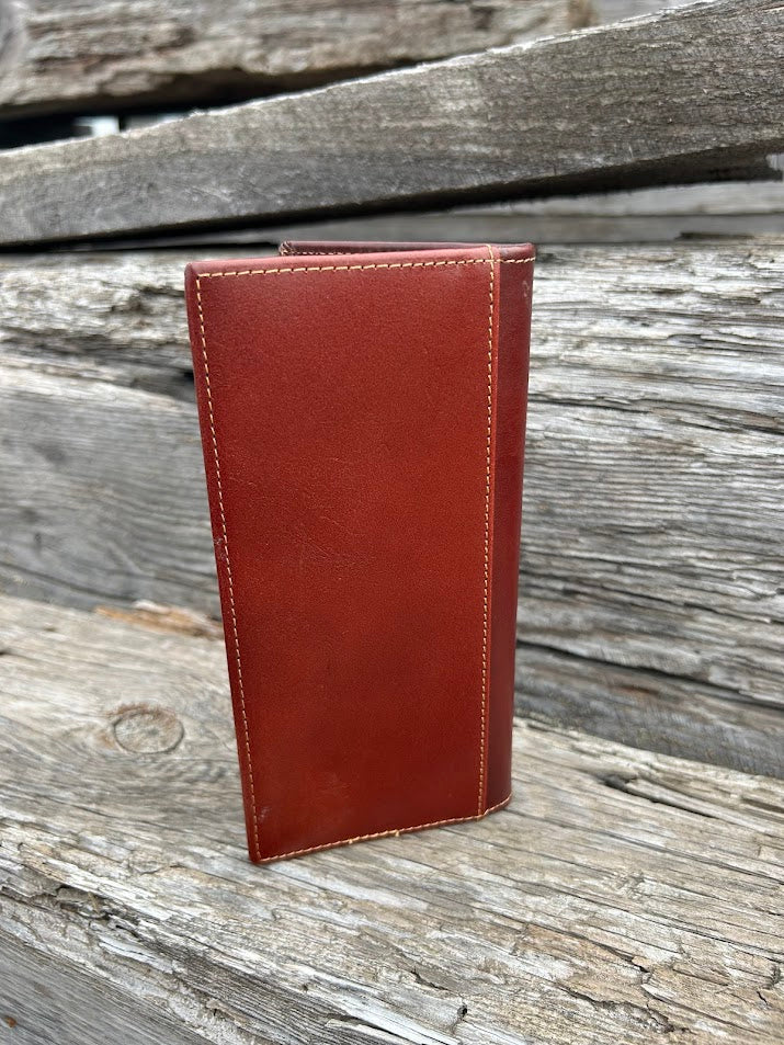 This Brown embossed leather tall wallet features multiple card and cash slots for optimal organization. Rear view showing a additional bill slot.