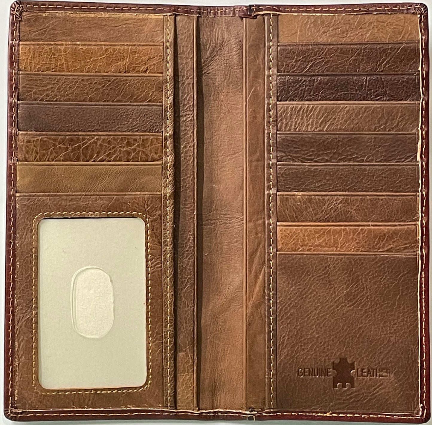 Brown leather wallet with multiple card slots and a visible brand logo.