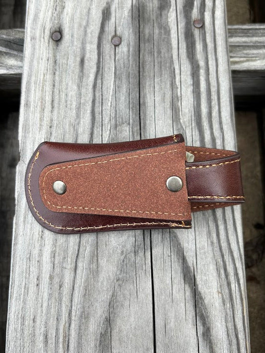 A Coffee Brown leather knife sheath with a decorative longhorn and star design. Rear view showing leather belt attachment.