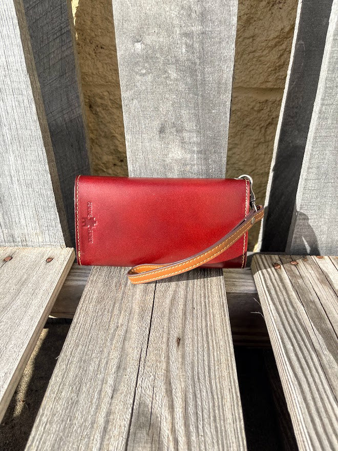 Brown tooled leather phone case wallet with Beige inlay. Rear View