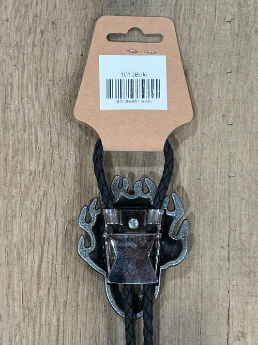 Metal clip with black cord on a cardboard backing with a barcode on a wooden surface