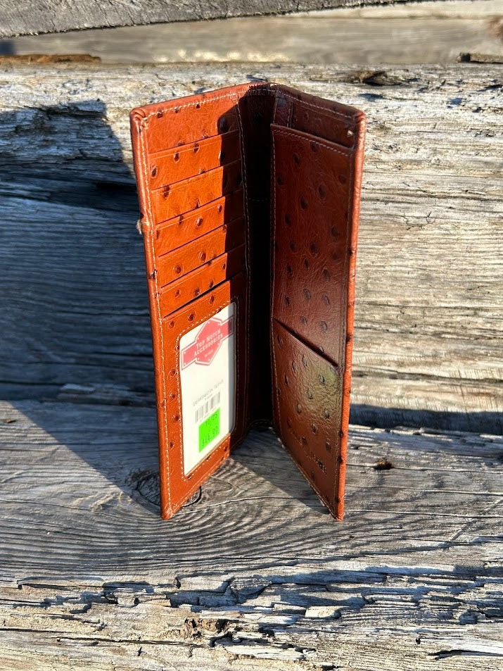 Brown leather wallet open on a wooden surface
