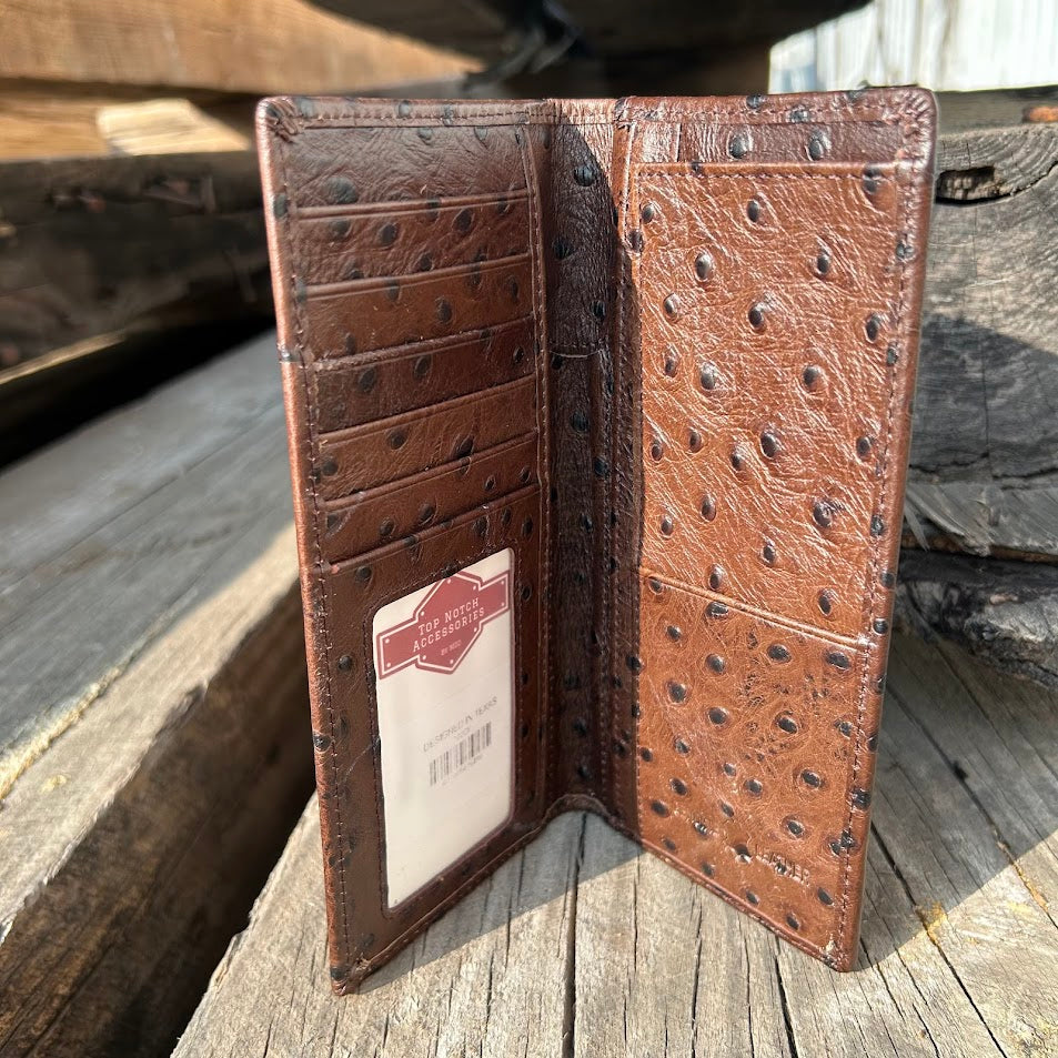 Coffee Brown textured leather wallet on a wooden surface