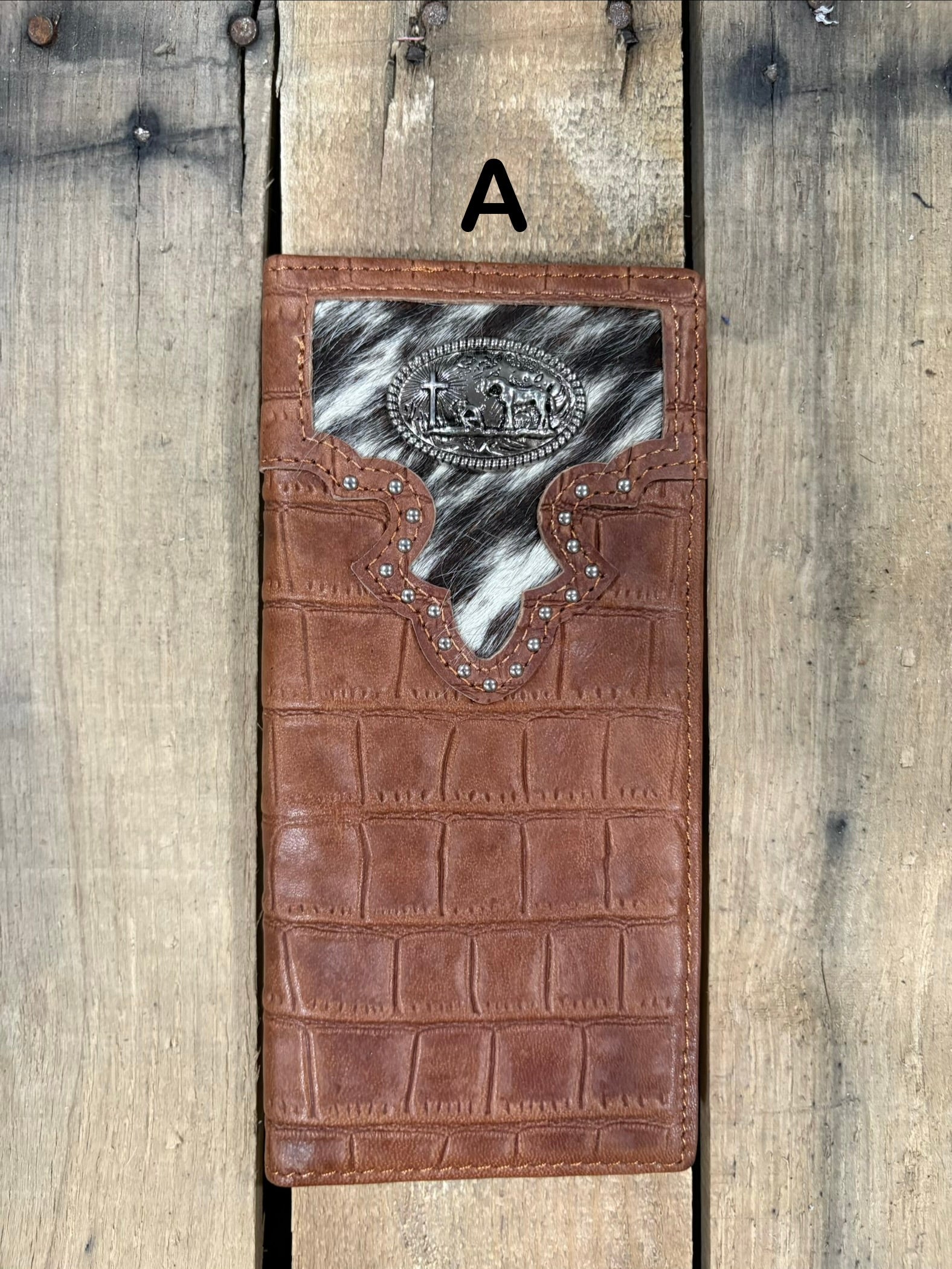 Brown alligator print leather checkbook wallet with a cowhide inlay featuring a Praying Cowboy Concho. Front View