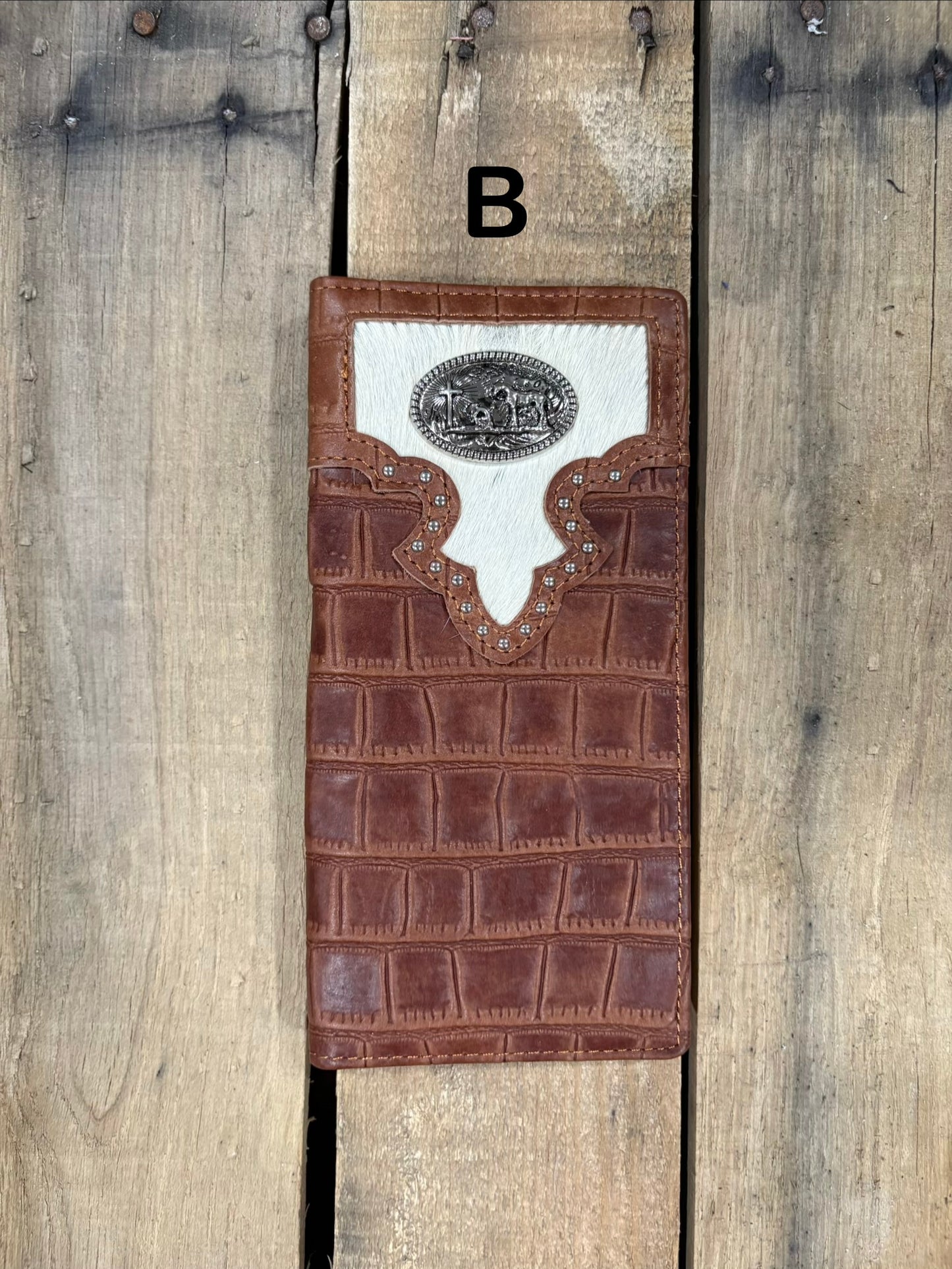 Brown alligator print leather checkbook wallet with a cowhide inlay featuring a Praying Cowboy Concho. Front View