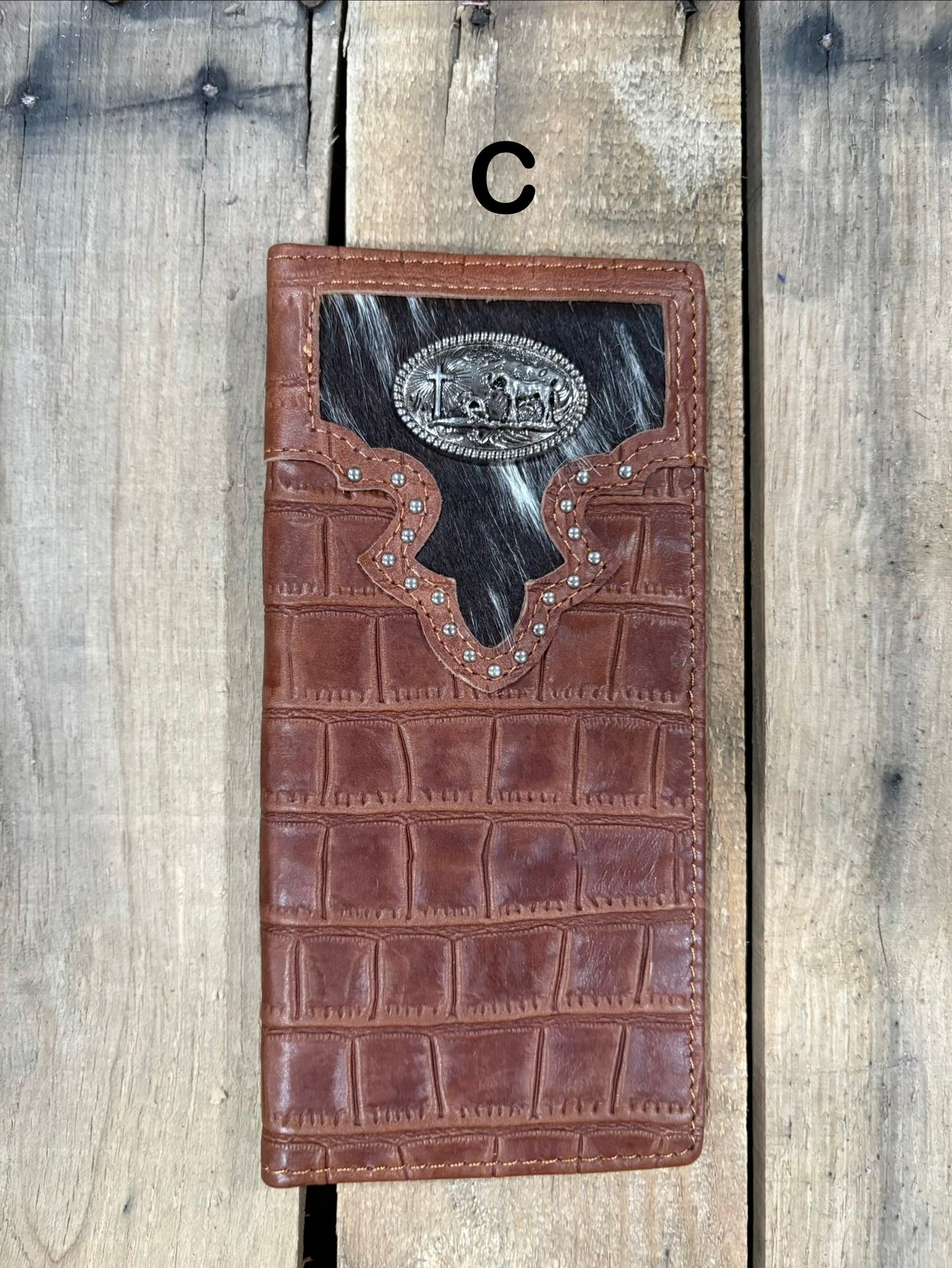 Brown alligator print leather checkbook wallet with a cowhide inlay featuring a Praying Cowboy Concho. Front View