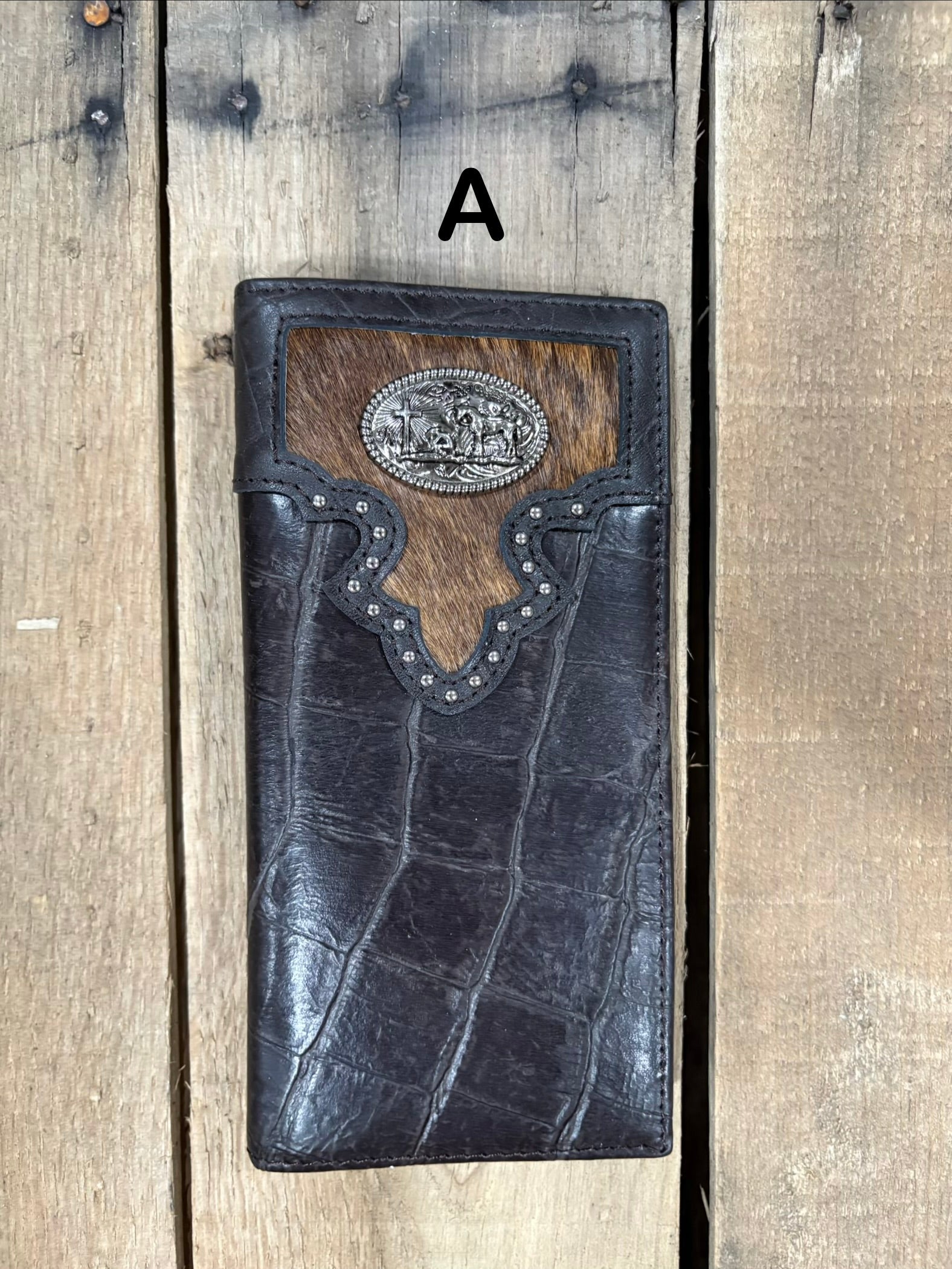 Coffee Brown alligator print checkbook wallet with a cowhide inlay featuring a Praying Cowboy Concho. Front View