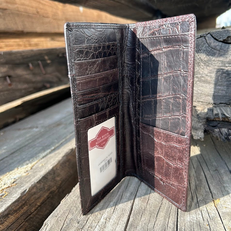Coffee Brown leather wallet with brand label on a wooden surface