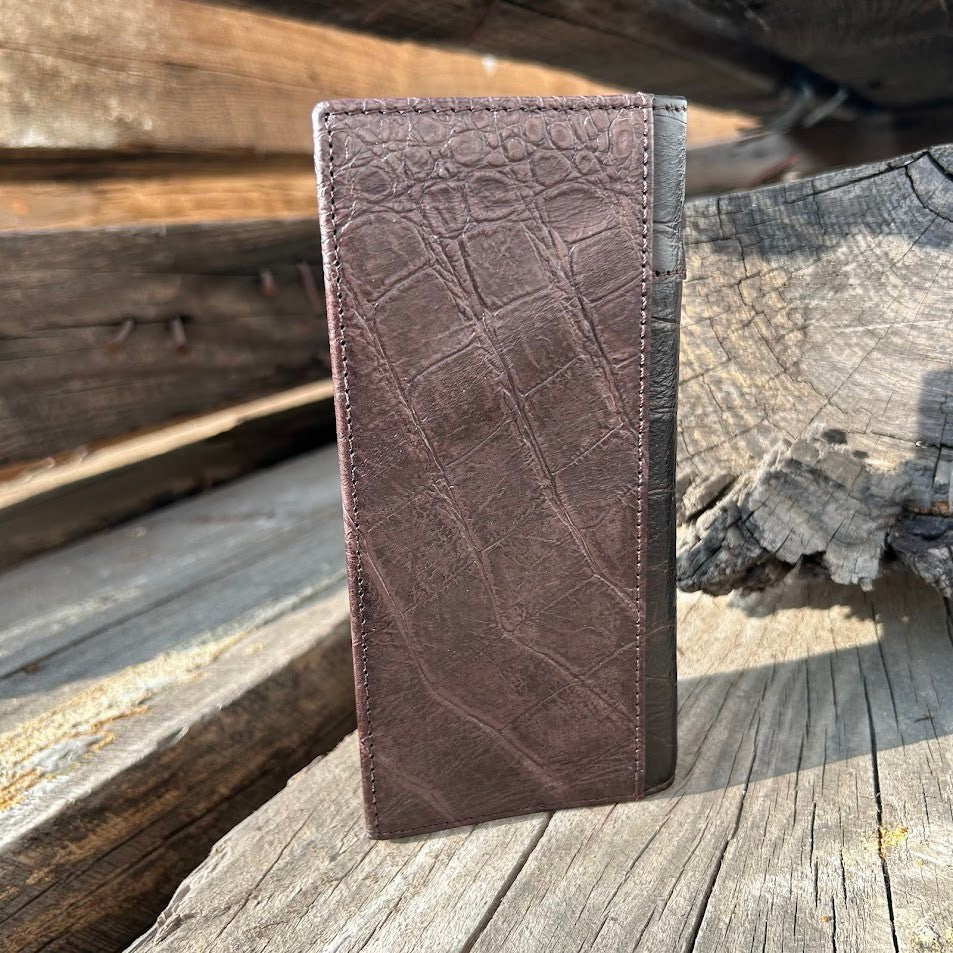 Coffee Brown leather wallet on a wooden surface