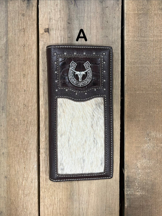 Coffee brown leather wallet with horseshoe and longhorn concho design on a wooden surface