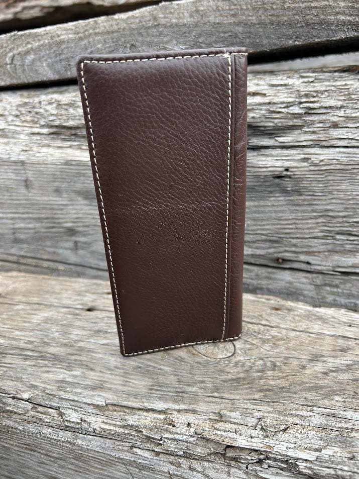Coffee Brown leather wallet on a wooden surface