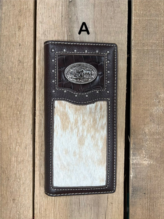 Coffee brown leather wallet with praying cowboy concho design on a wooden surface