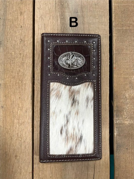 Coffee brown leather wallet with bull rider concho design on a wooden surface