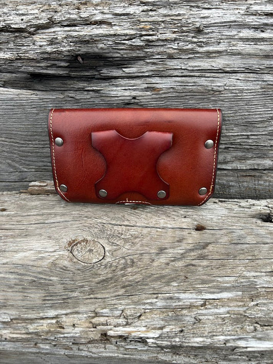 Brown Leather phone case with Texas Star Concho, attaches with a leather belt loop that measures 2 3/4 inches high. Rear view