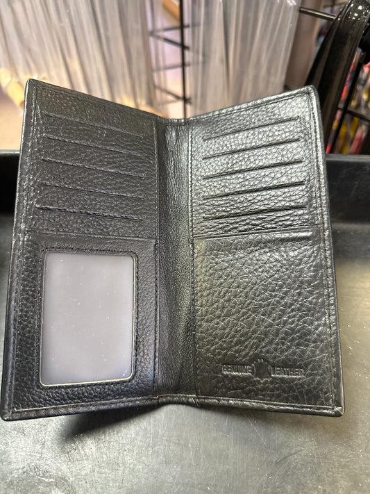 Black leather wallet with a card holder on a metallic surface