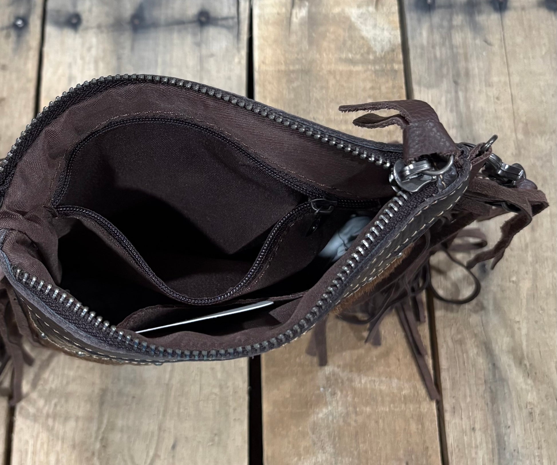 Inside zipper view of Coffee Brown leather crossbody purse