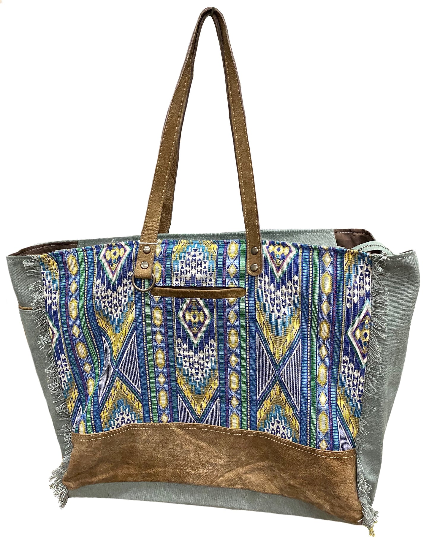 A blue multi canvas and leather conceal carry weekender bag with a geometric pattern. Front View
