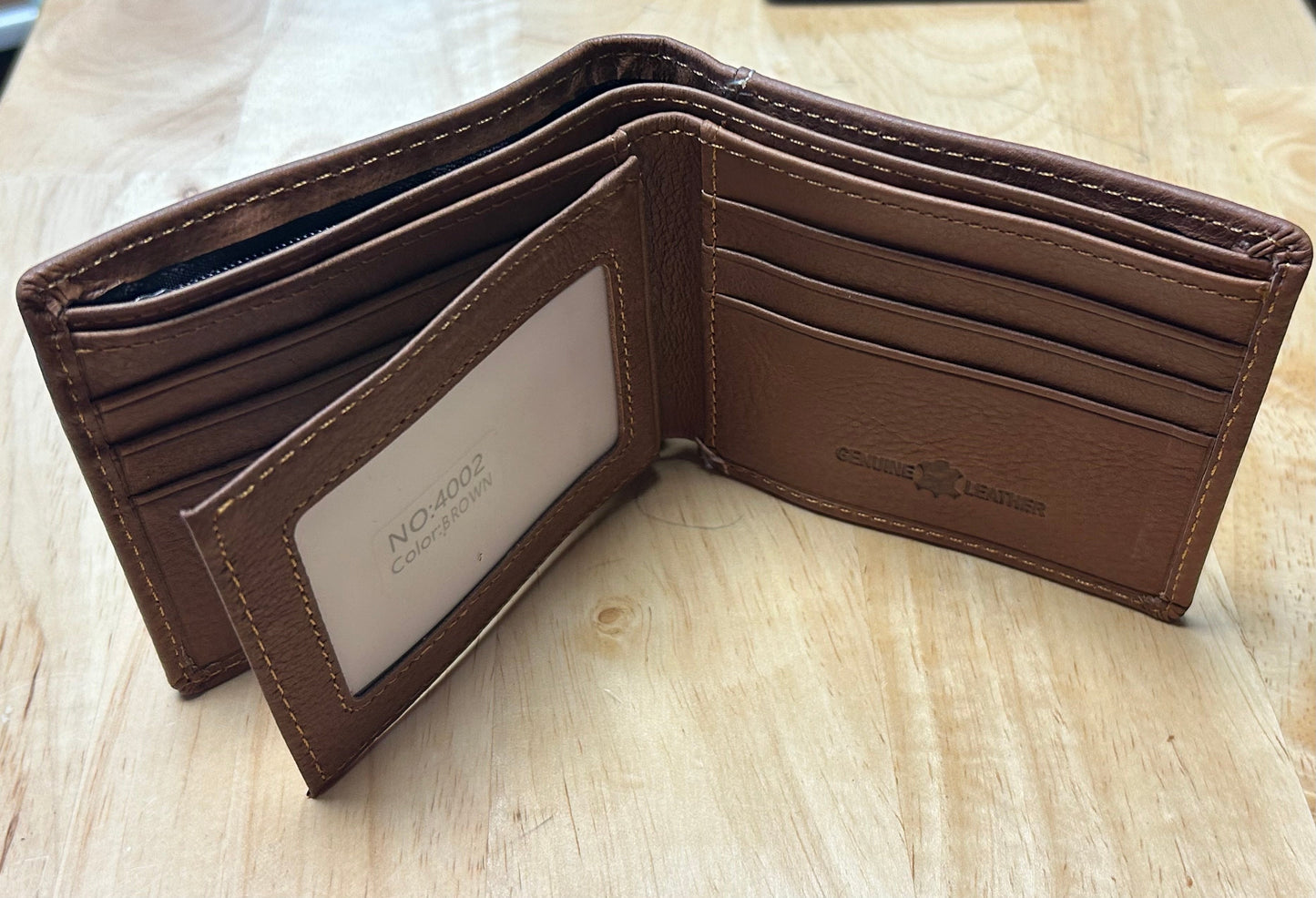 Brown leather wallet with visible brand name on a light wooden surface