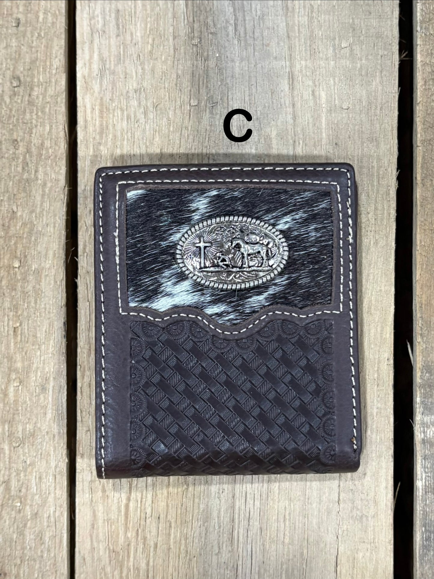This Coffee Brown basketweave leather wallet has a cowhide inlay featuring a Praying Cowboy Concho. 