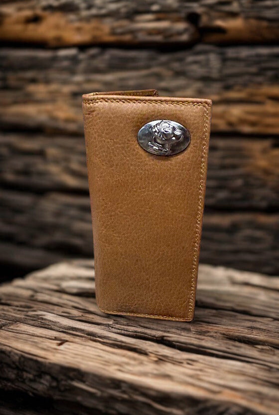 Brown leather wallet with a silver concho on a wooden surface