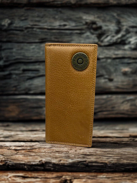 Brown leather wallet with a shotgun shell concho on a wooden surface