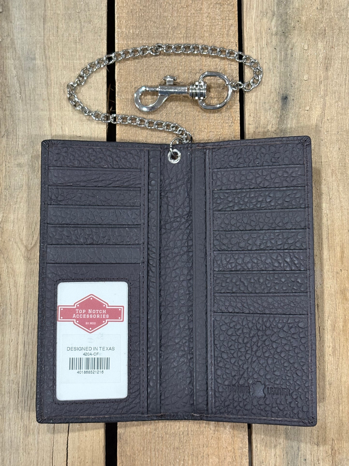 Coffee Brown leather wallet with chain on a wooden surface