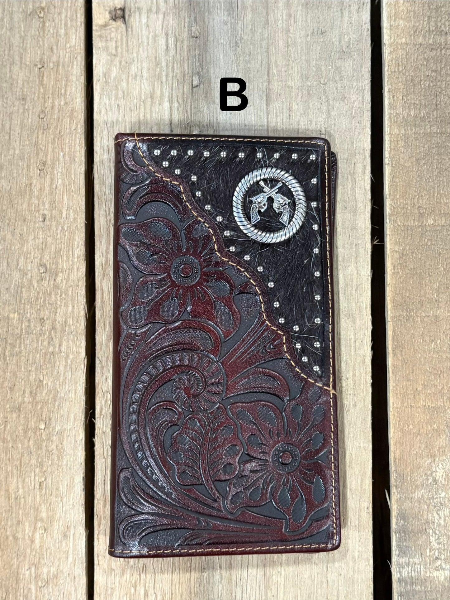 Coffee Brown leather wallet with floral embossing and silver studs on a white background