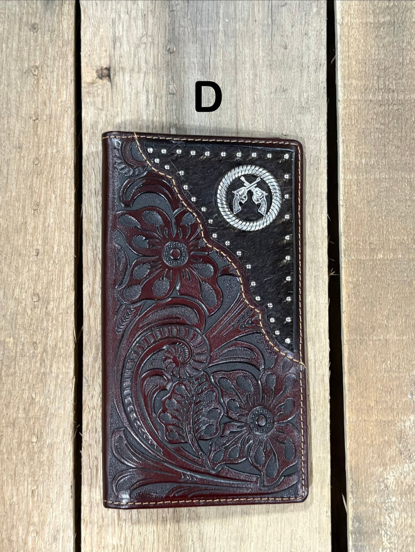 Coffee Brown leather wallet with floral embossing and silver studs on a white background
