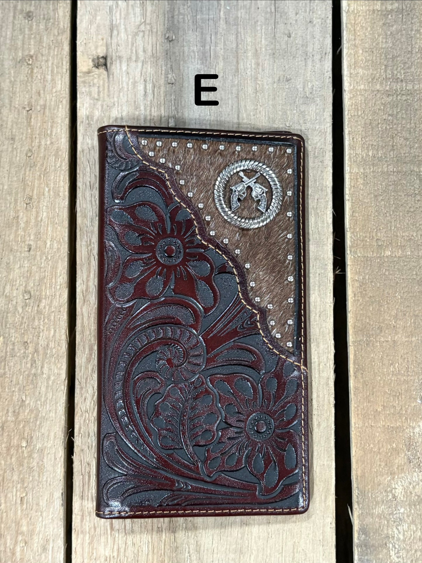 Coffee Brown leather wallet with floral embossing and silver studs on a white background