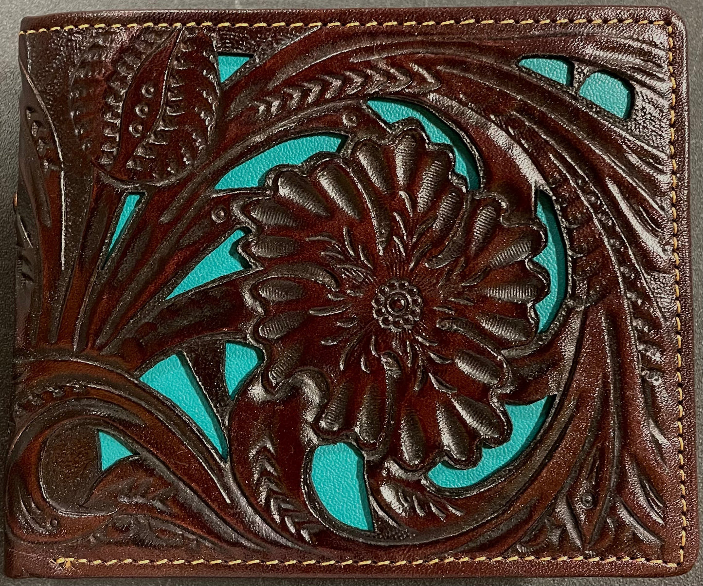Coffee Brown leather wallet with floral design and turquoise inlay on a Black background