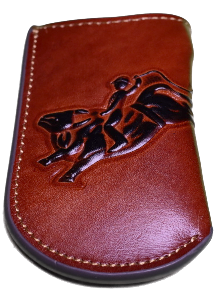 Brown leather knife sheath with a embossed Bull Rider design. Close up front view.