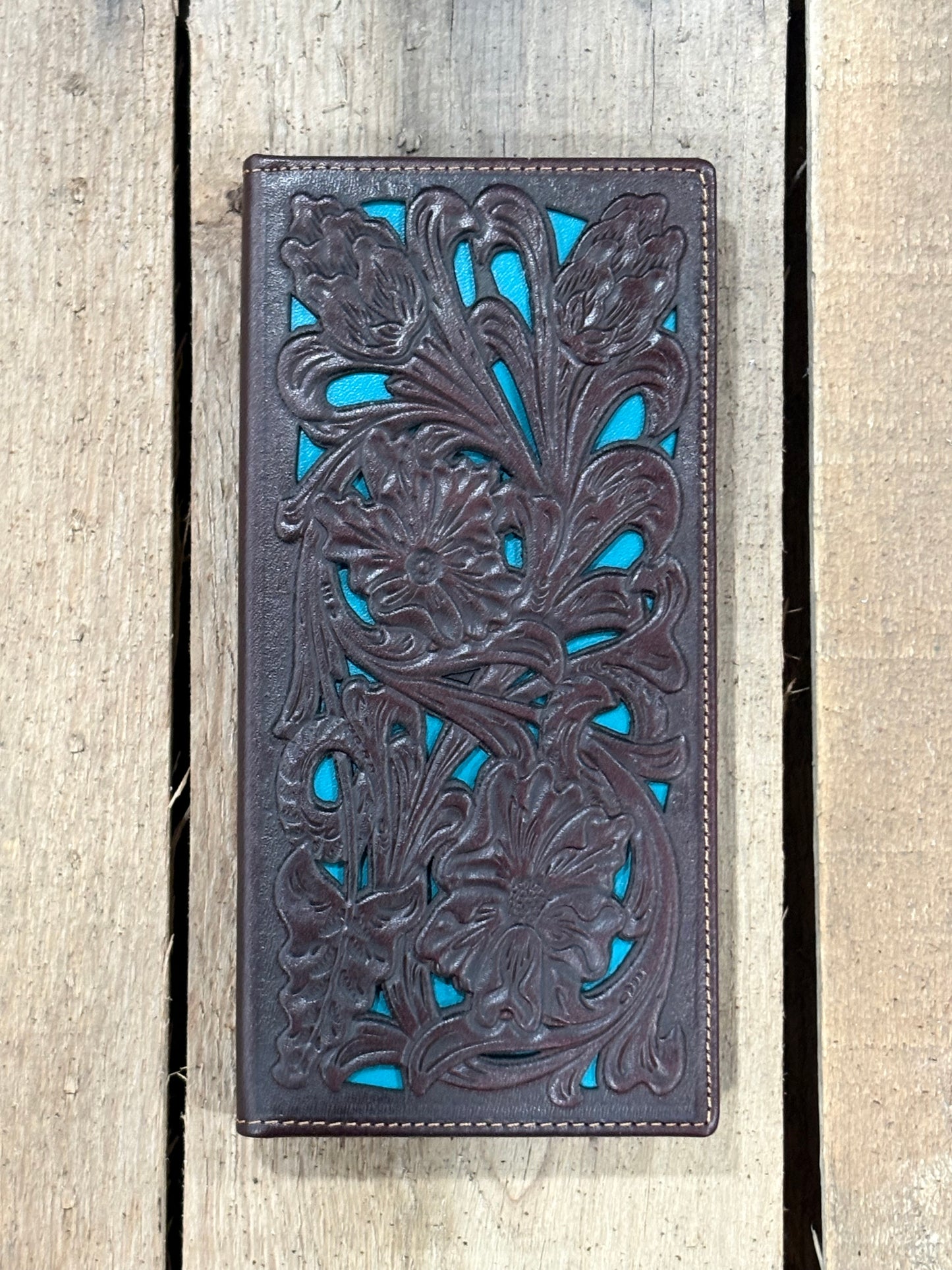 Coffee Brown leather wallet with intricate floral turquoise inlay designs on a wooden surface