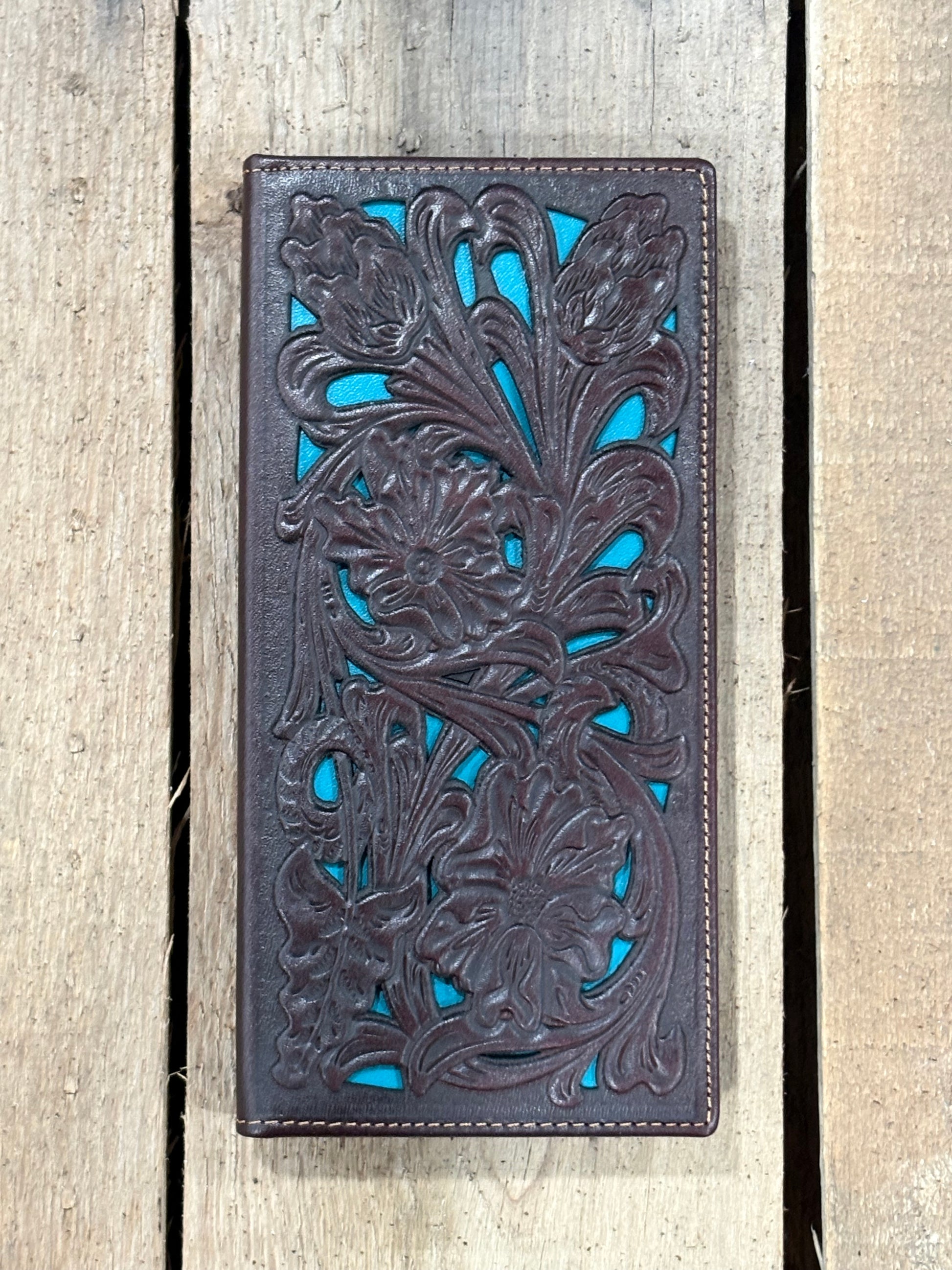 Coffee Brown leather wallet with intricate floral turquoise inlay designs on a wooden surface