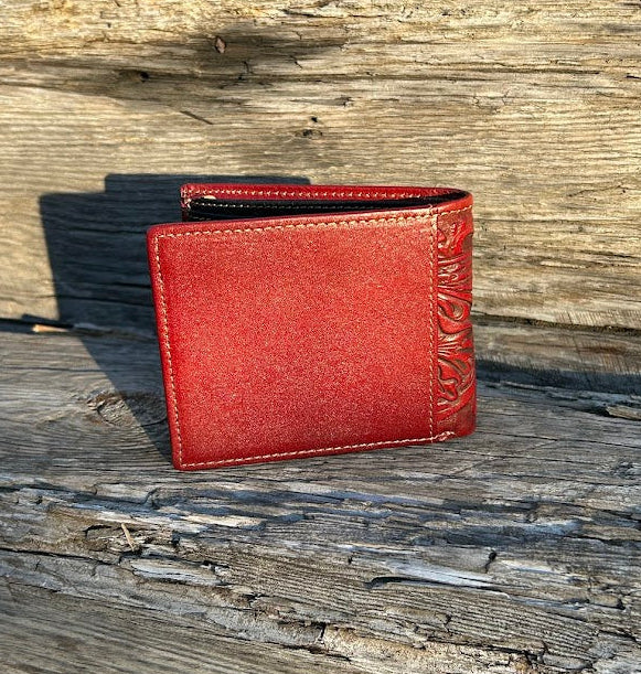 Brown wallet on a wooden surface