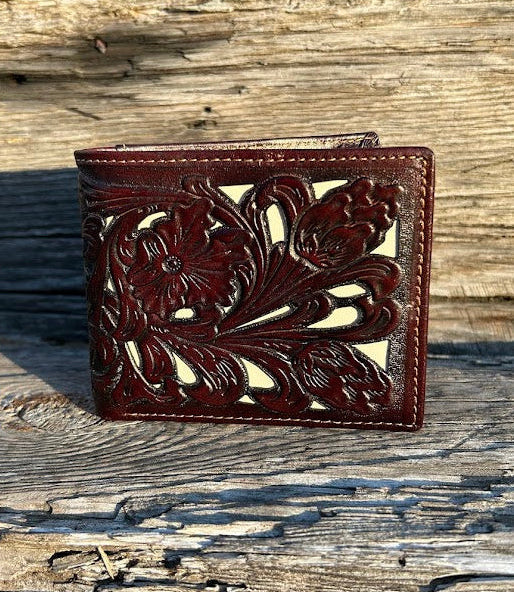 This Coffee Brown leather bifold wallet features a intricate tooled leather pattern with a Beige inlay. Front View