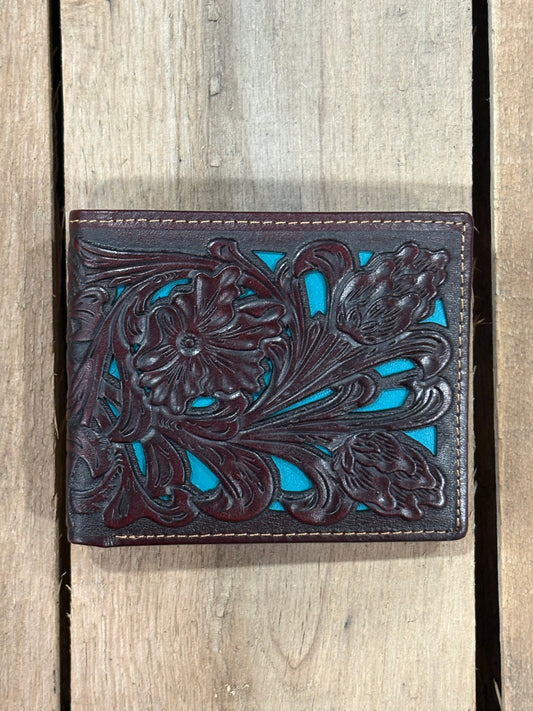 Close up of a Coffee Brown decorative leather wallet with intricate floral inlay patterns on a wooden background