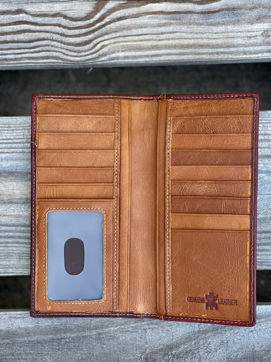 Brown leather wallet with card slots on a wooden surface