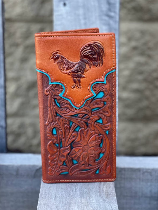 Light Brown leather wallet with intricate designs and a rooster emblem on a wooden surface.