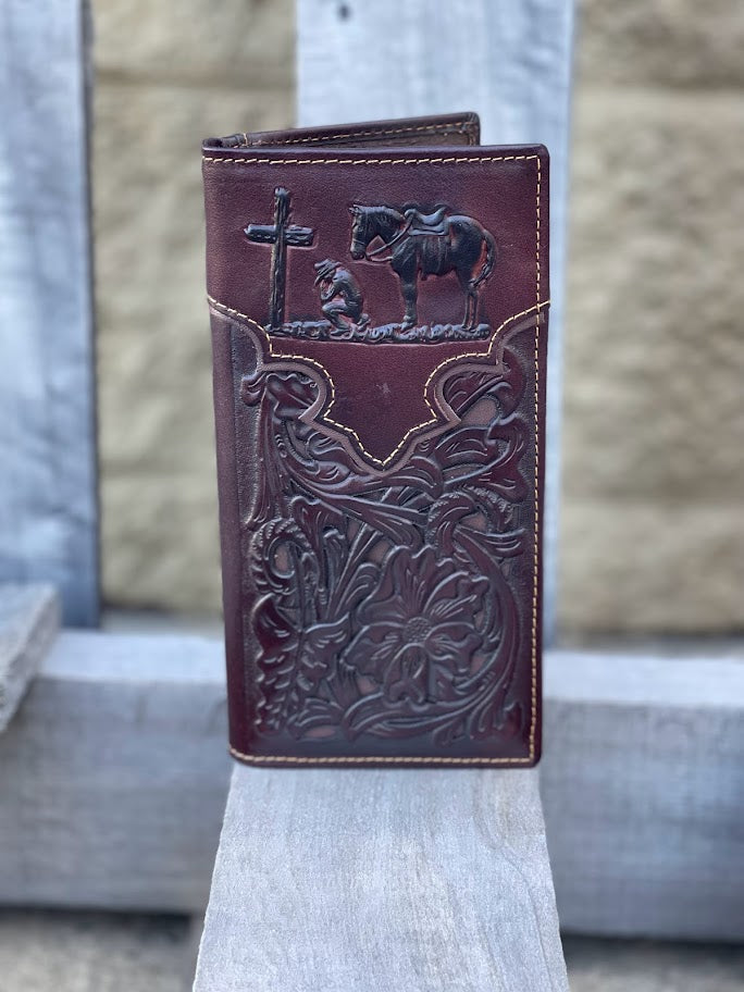 Coffee Brown leather wallet with embossed designs on a wooden surface