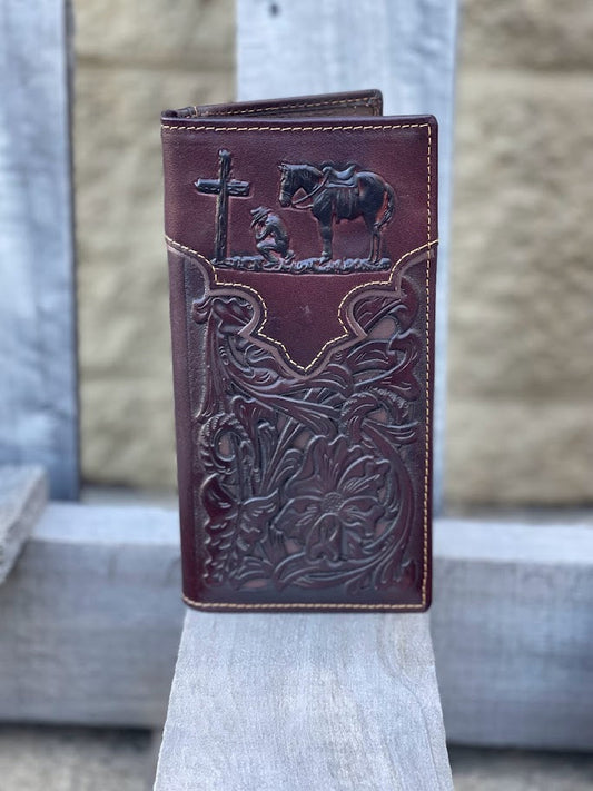 Coffee Brown leather wallet with embossed designs on a wooden surface