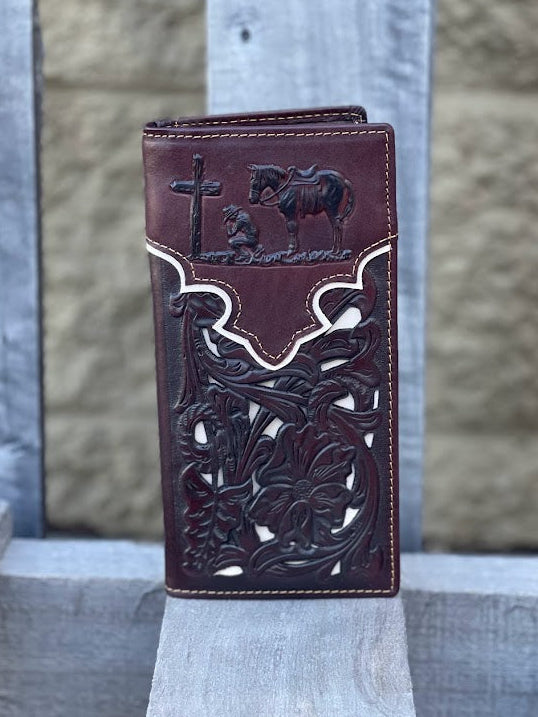 Coffee Brown leather wallet with intricate designs on a wooden surface