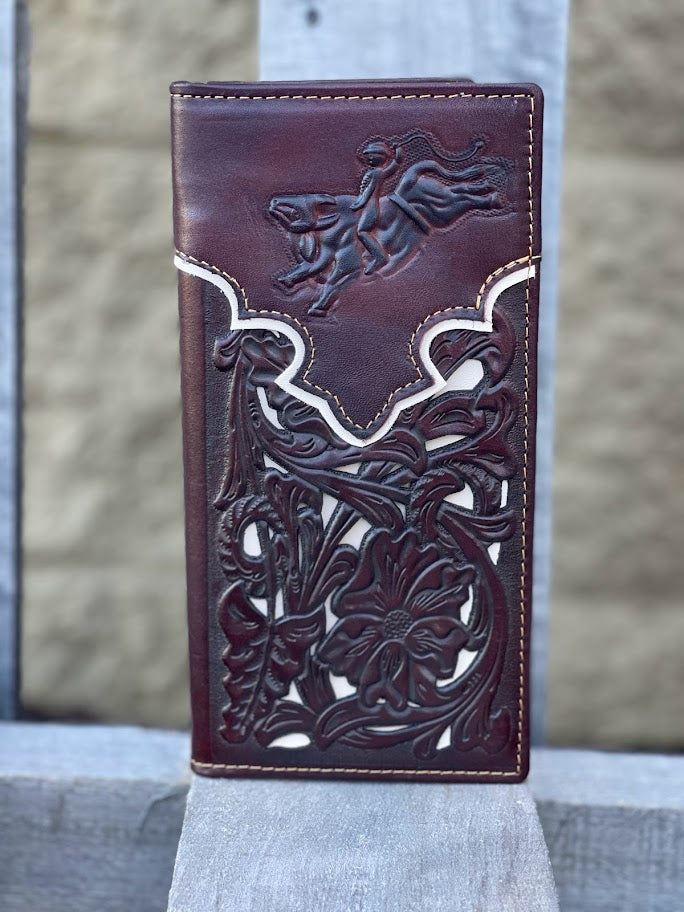 Coffee Brown leather wallet with intricate cut-out designs on a wooden surface
