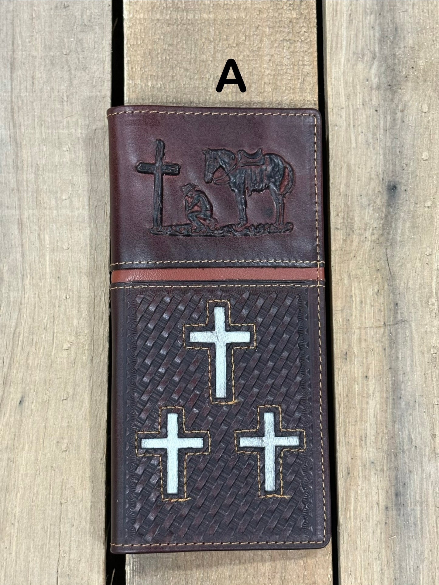 Coffee Brown leather cover with embossed designs of crosses and a horse, featuring metal cross symbols.