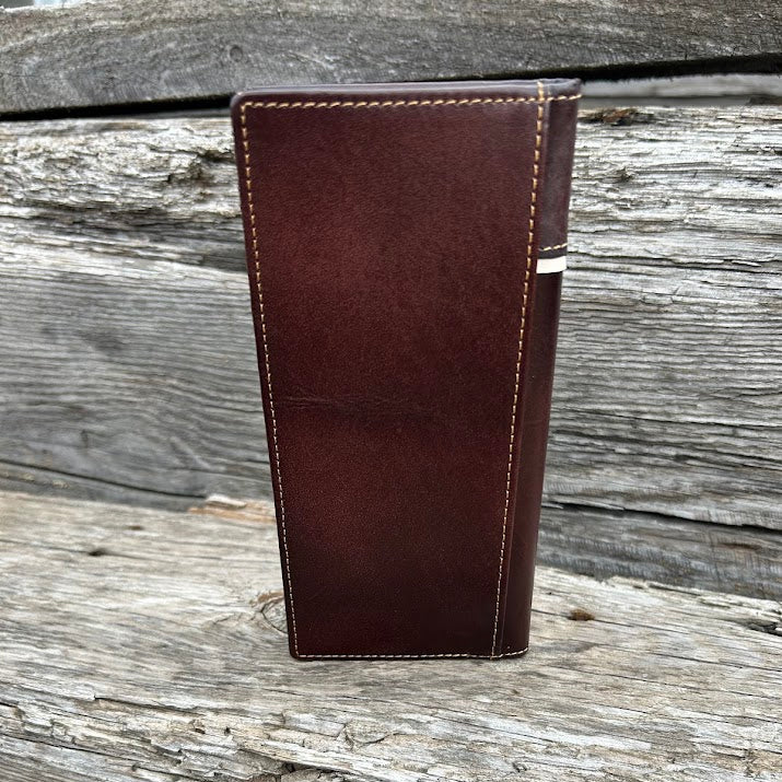 Coffee Brown leather wallet on a wooden surface